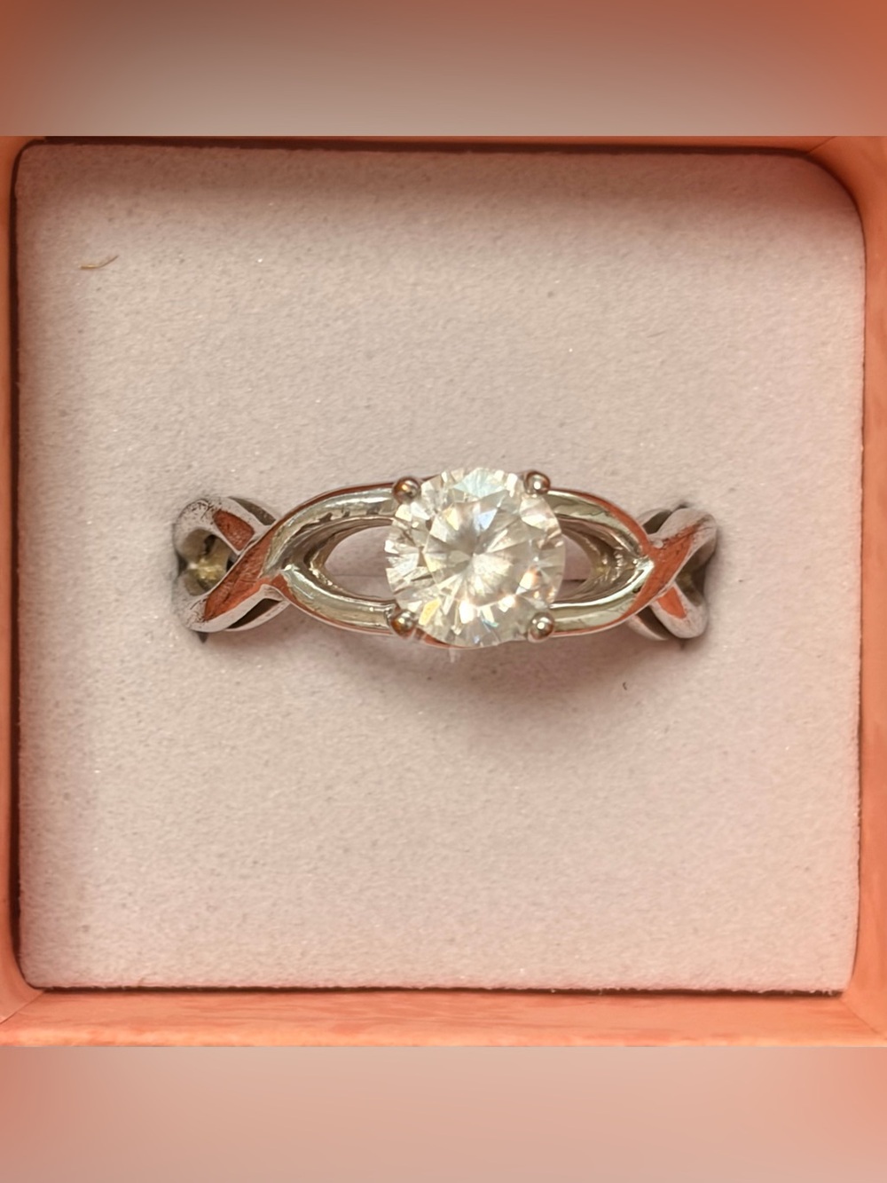 Solitaire Twist Silver Engagement Ring with Clear Stone